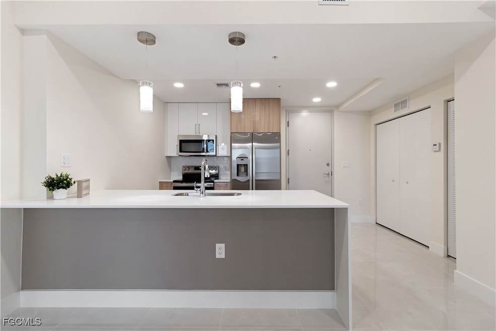 26600 Rosewood Pointe Dr unit B-101, Bonita Springs, FL 34135 - photo 1