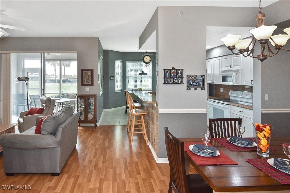 View from entry hall to dining and living room are