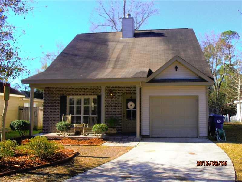 Facade/Exterior Front. Driveway parks 3+ Cars
