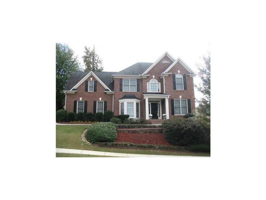 Exterior Front. Brick front large traditional home