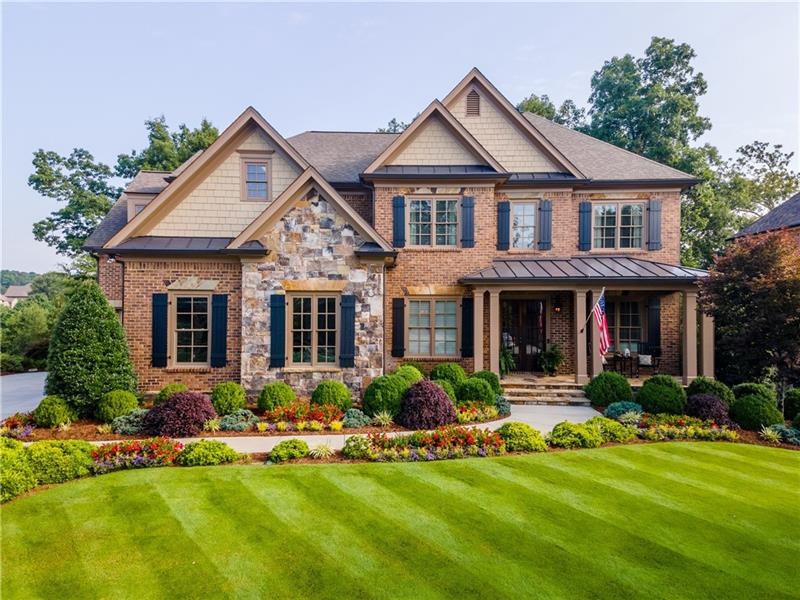 Stunning curb appeal with lush landscaping!
