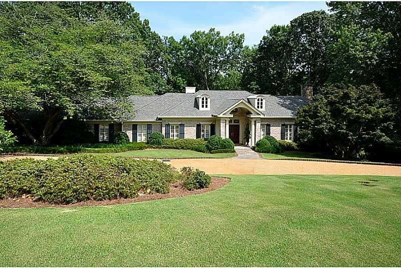 Exterior Front. Stately brick traditional with cir