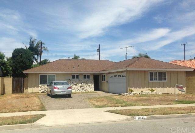 Front of house - notice upgraded vinyl windows and