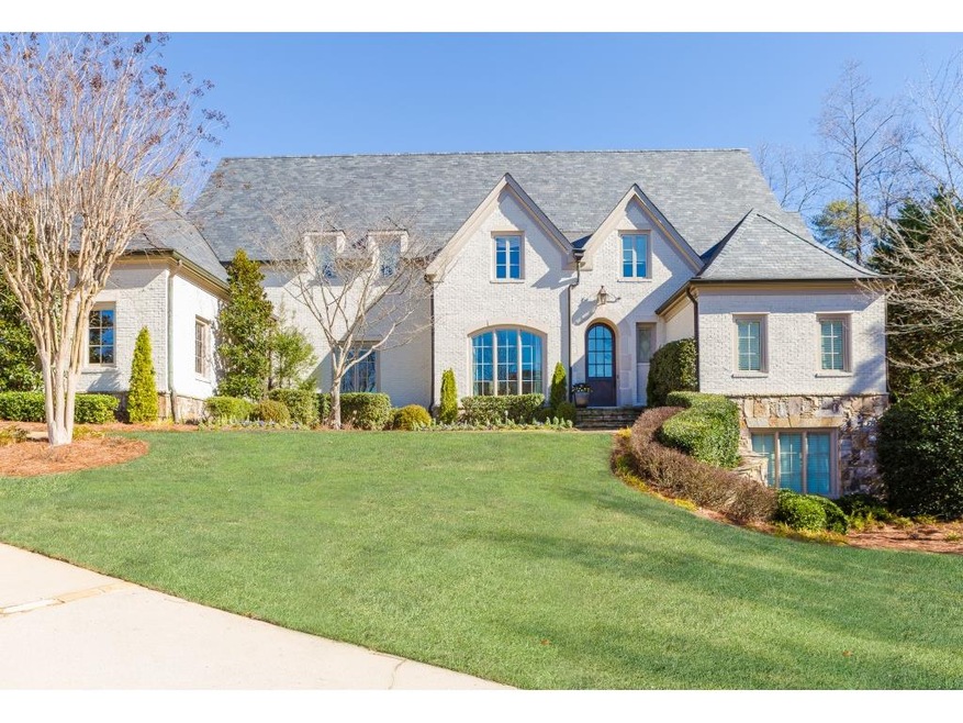 Simply stunning! Custom Harrison Design home w/mas