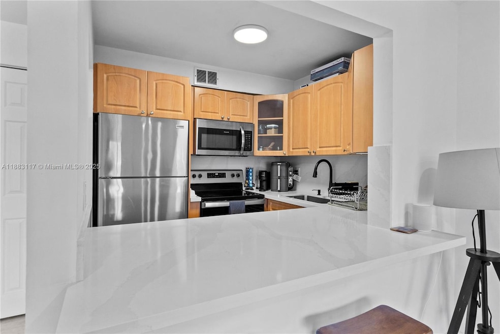 Kitchen pass through window and breakfast bar