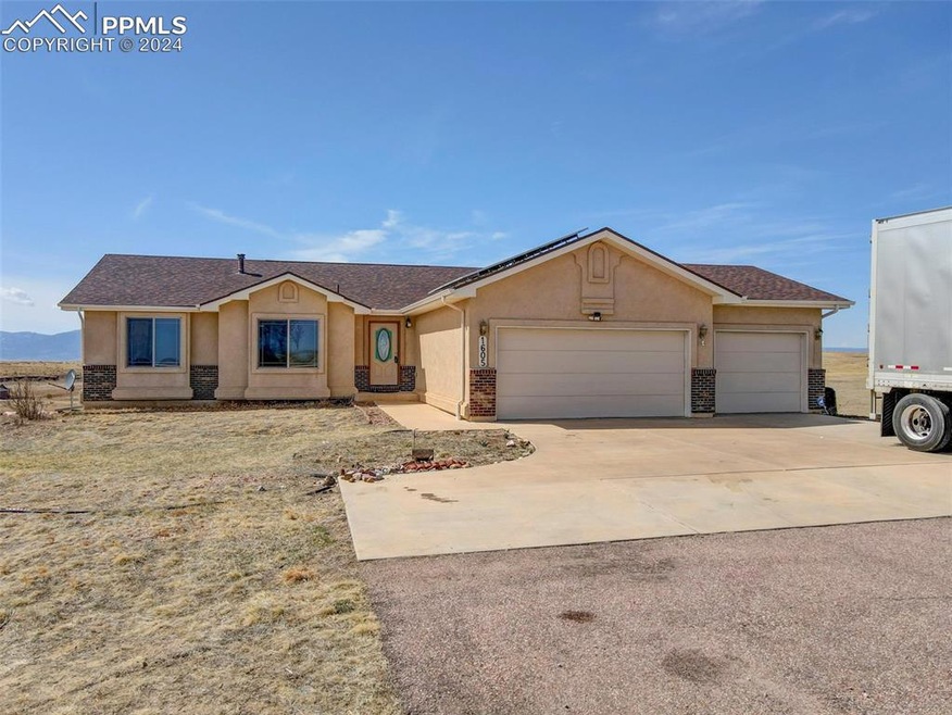 Single story home with a garage