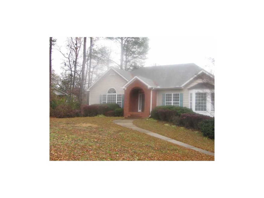 Exterior Front. Brick & frame ranch with partial b