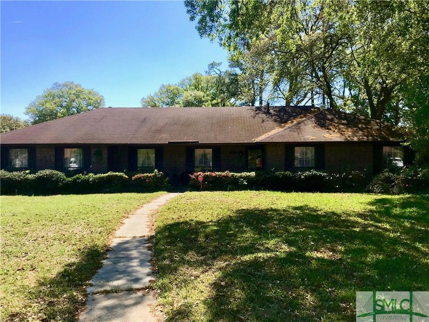 Full brick and one third of an acre.