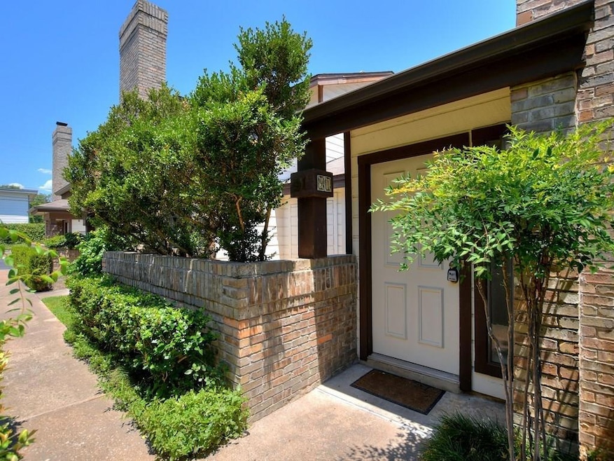 Property entrance with brick siding
