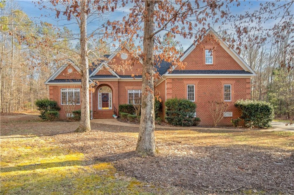 2 First Floor Primary Suites, all-brick, NEW ROOF,