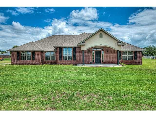 Exterior Front. 1.3 acres with side entry garage. 