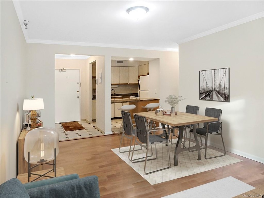 Open Kitchen and Dining Room View (Virtually Stage