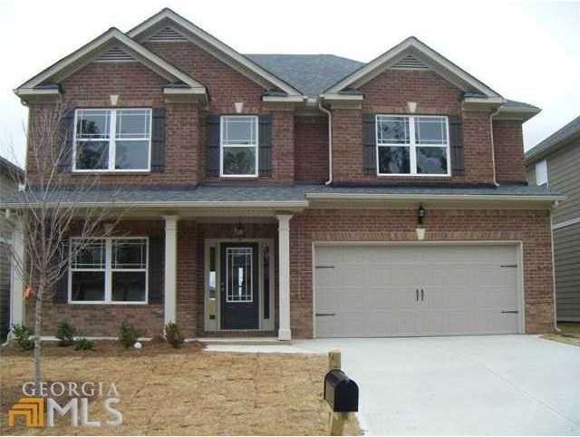 Exterior Front. STOCK PHOTO HOME UNDER CONSTRUCTIO