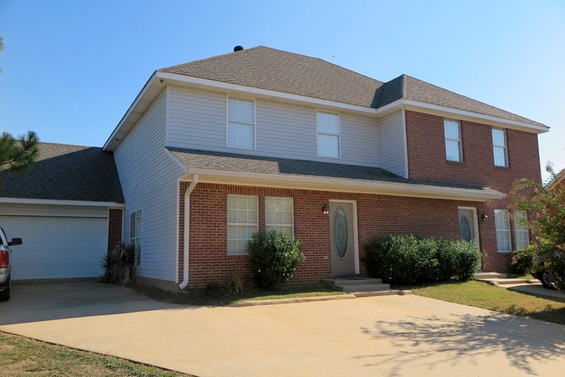 Left Side Of Townhome has a 2 car garage