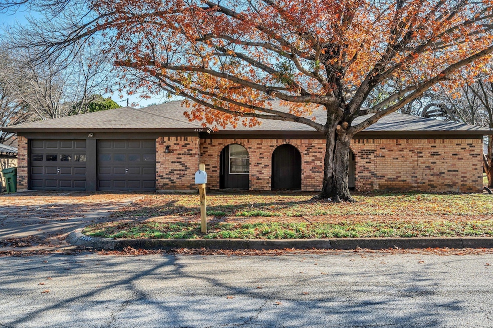Ranch-style home featuring a garage