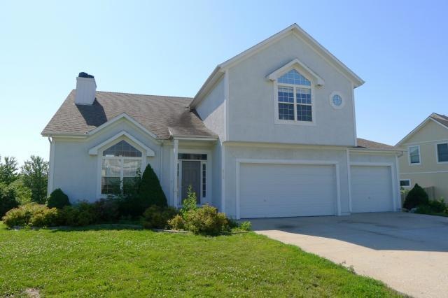 615 Cedar Ridge Dr, Raymore, MO 64083 - photo 1