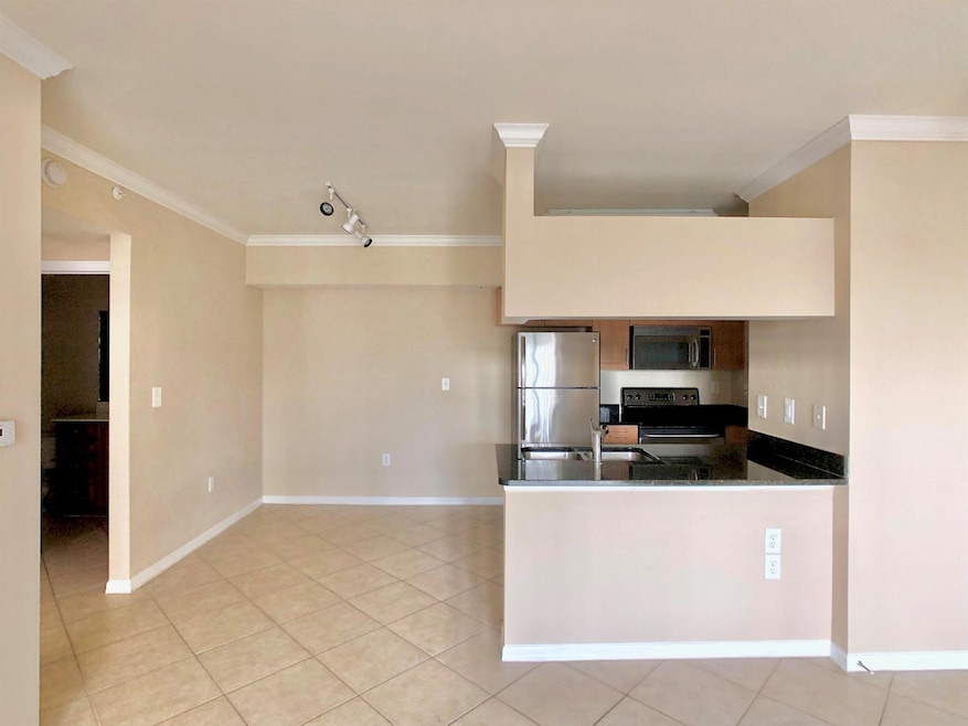 6466 Emerald Dunes Dr unit 203, West Palm Beach, FL 33411 - photo 1