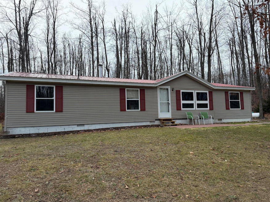 765 Mcgregor Rd, Vanderbilt, MI 49795 - photo 1