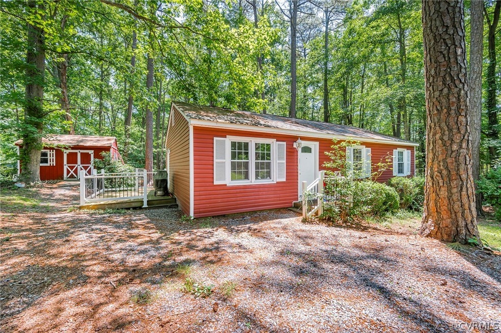 View of front facade featuring a storage shed