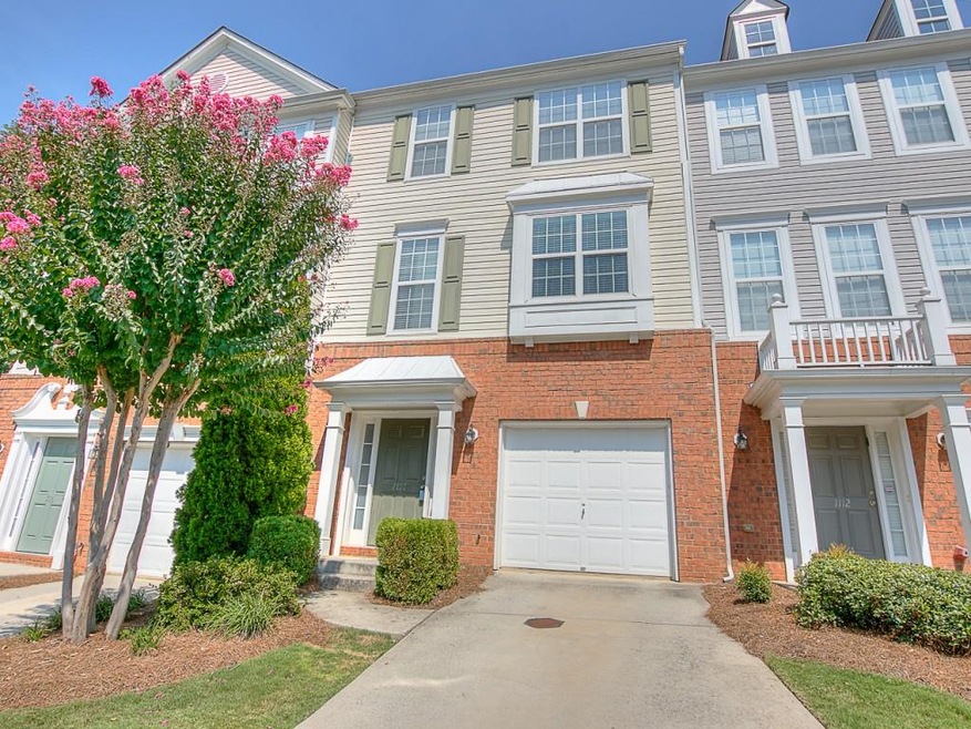 Exterior Front...notice the 1 car attached garage