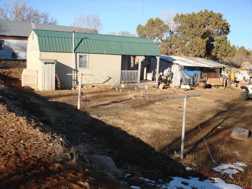 308 E 4th St, Dove Creek, CO 81324 - photo 1