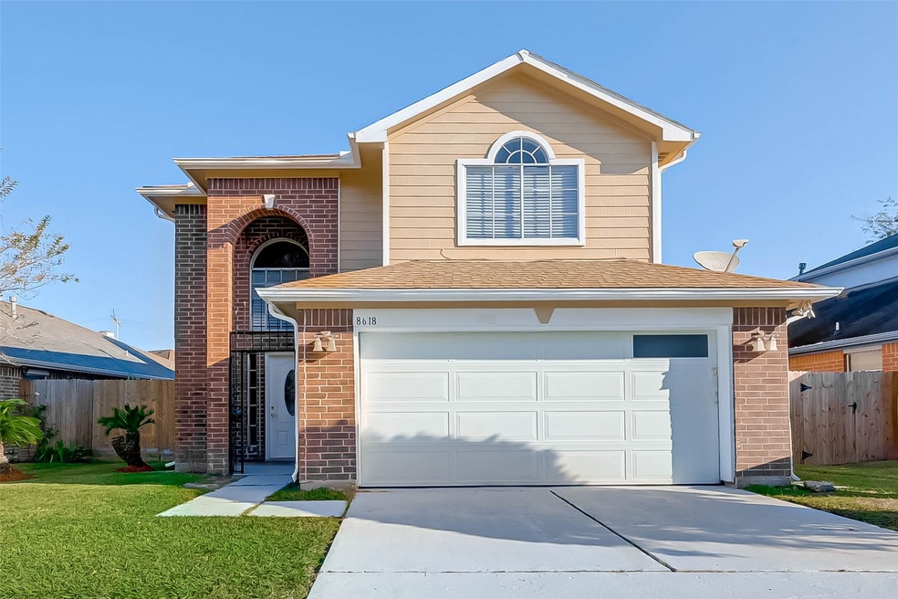 8618 Wild Basin Dr, Houston, TX 77088 - photo 1