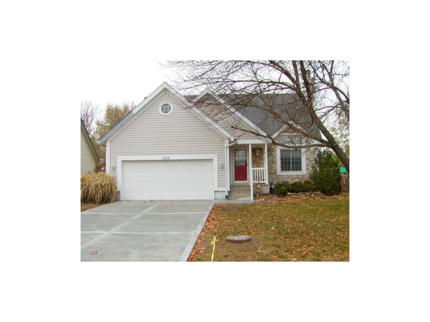 Front with new driveway