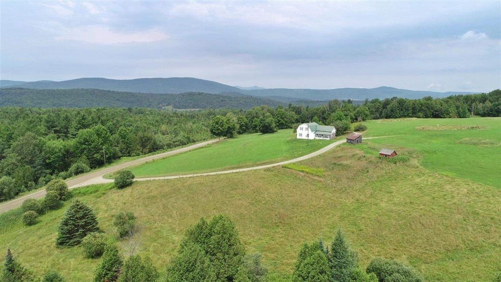 1369 W Glover Rd, Irasburg, VT 05845 - photo 1