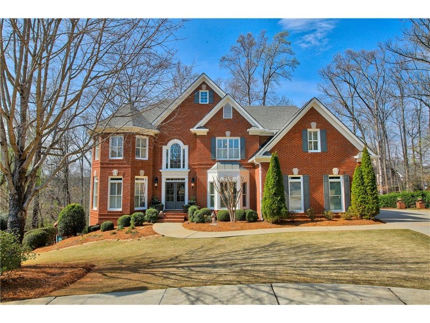 Stunning brick home on 1.1 acres in private culdes