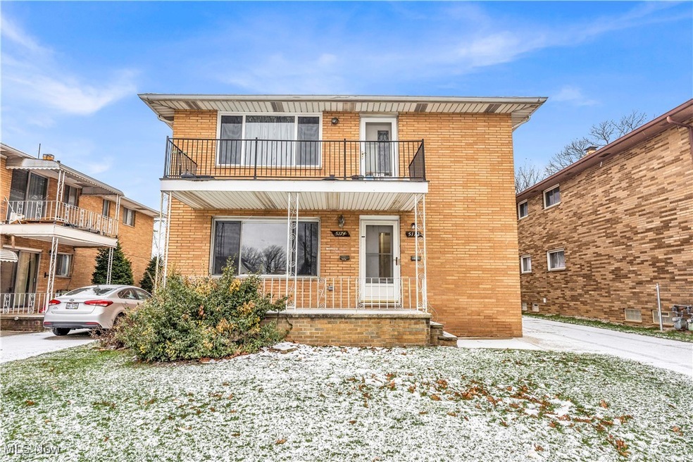 Front facade with a balcony and a porch