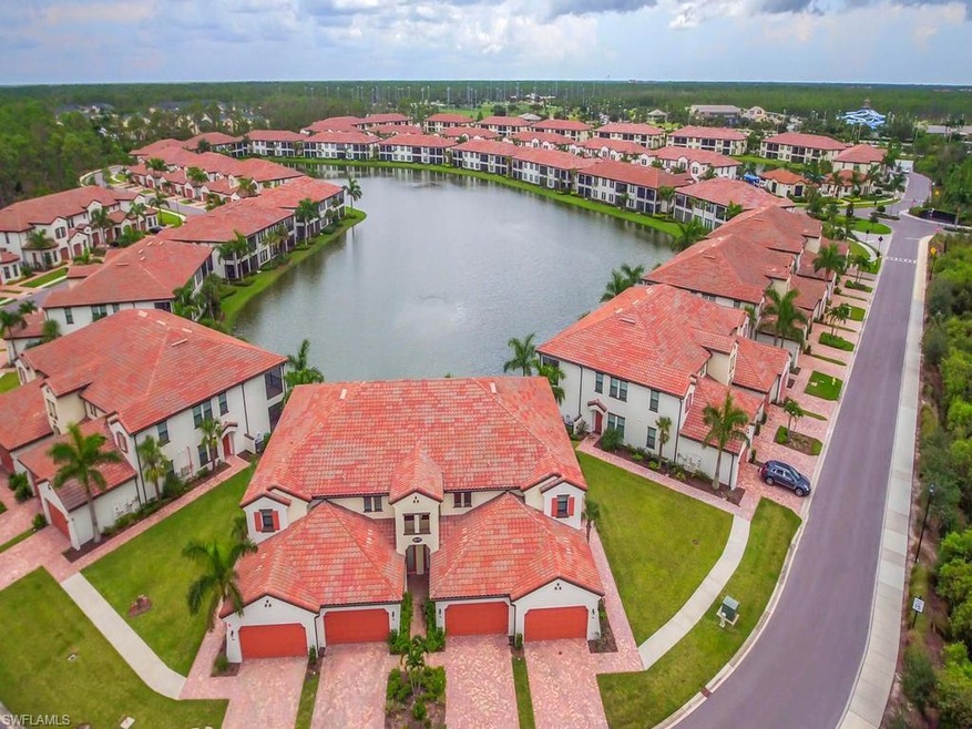 Aerial view of building.  Unit entrance is on the 