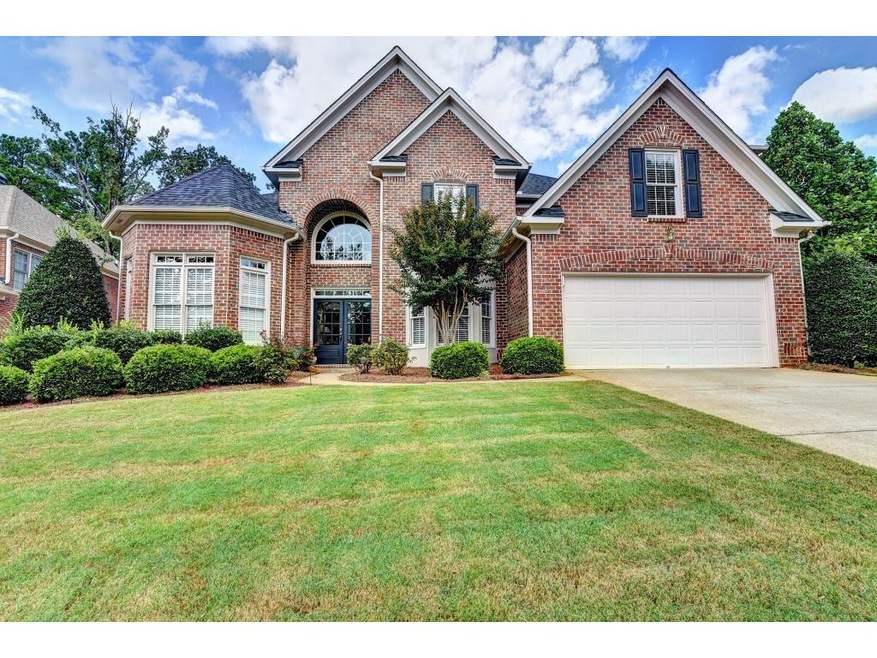 4BR 3.5BA Three Sided Brick Home
