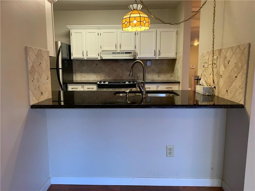 Kitchen with stainless steel appliances, tasteful 