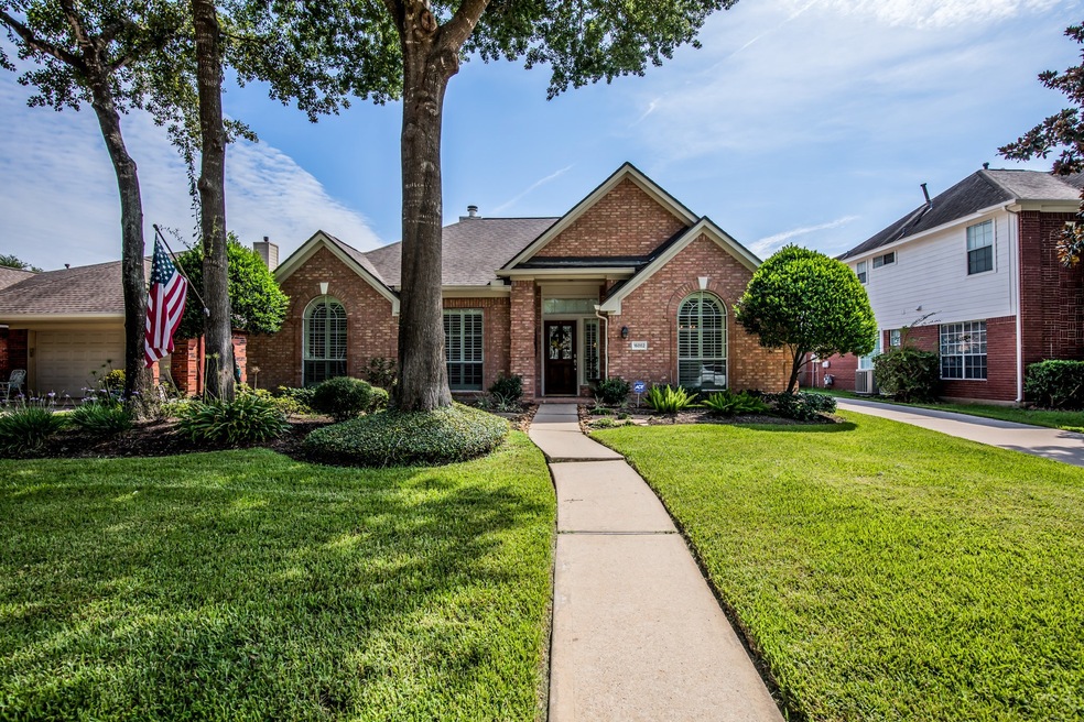 Deluxe curb appeal... this home is located in Lakewood Grove and in the Tomball school district.