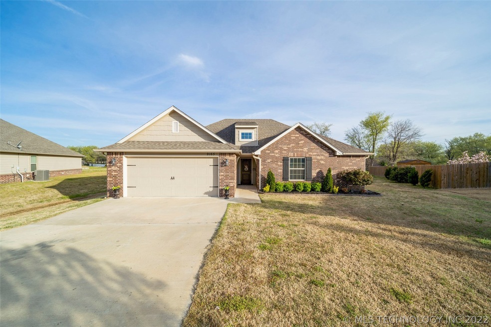 3 bed, 2 bath, 2 car garage, 1/2 acre lot.