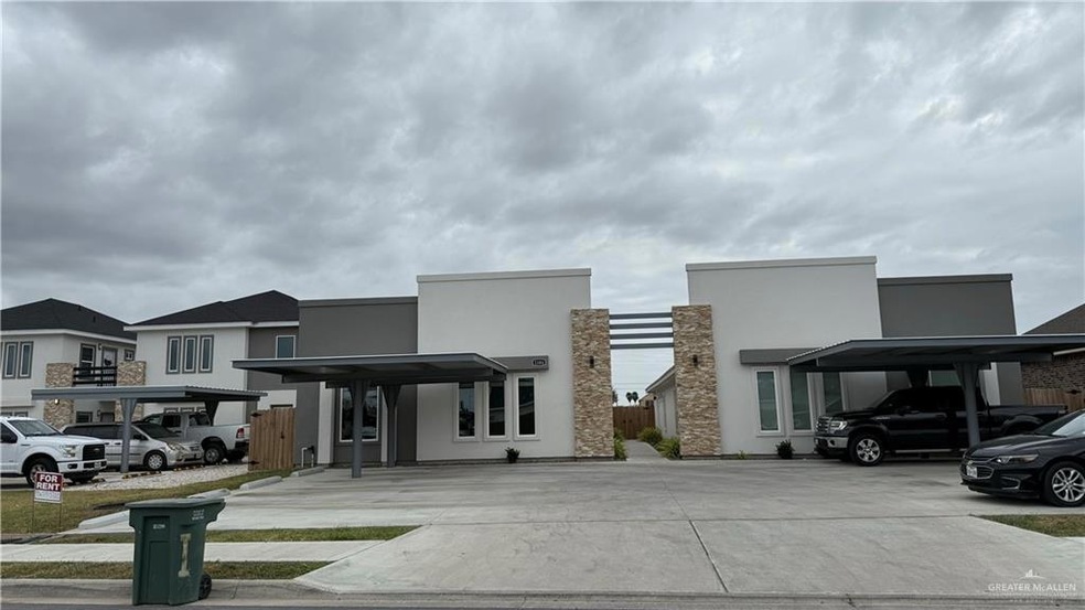 View of front facade with a carport
