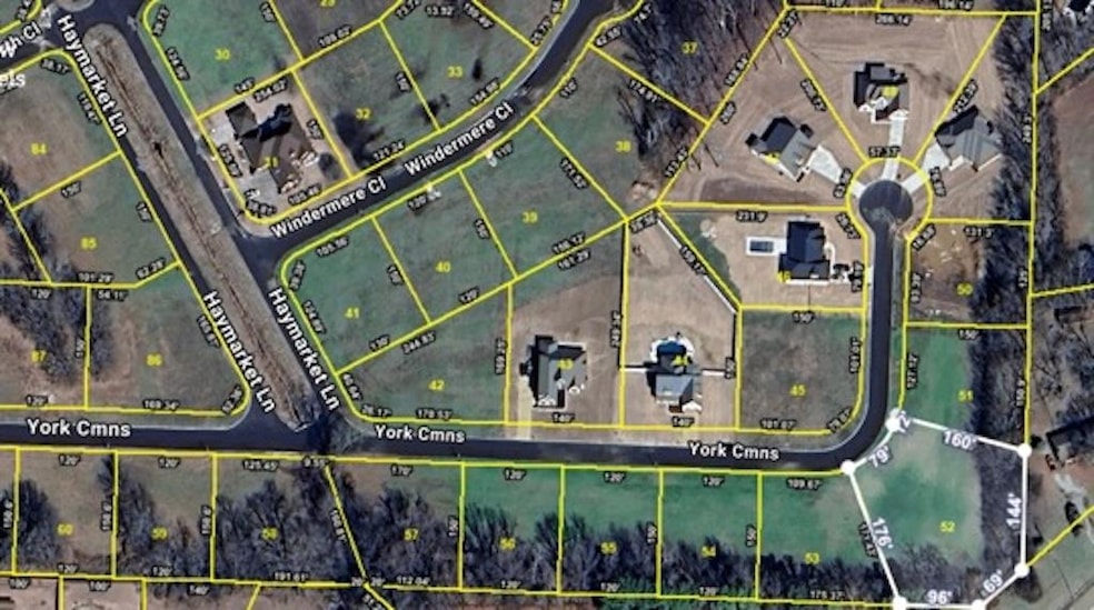 Aerial overview of property's location with property parcel outlined