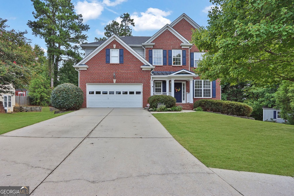 3916 Embassy Walk Ct, Lilburn, GA 30047 - photo 1