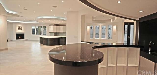 view from wet bar into the kitchen