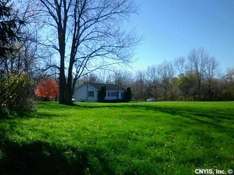 Exterior Front. Beautiful front yard. A home setba