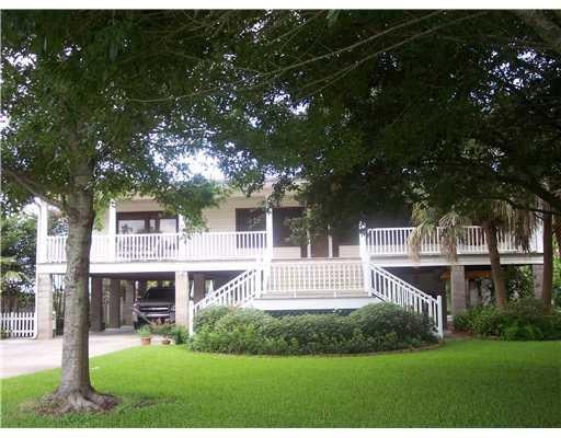 Exterior Front. WATER FRONTAGE ON FRONT AND BACK. 