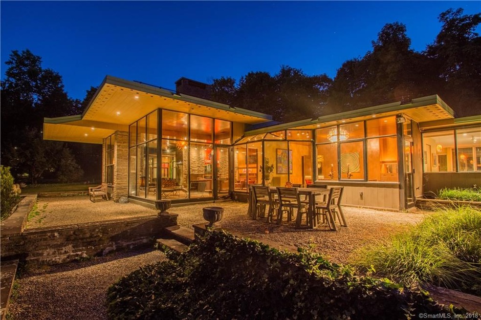 Welcome to 37 Old Brook Rd! This twilight photo hi