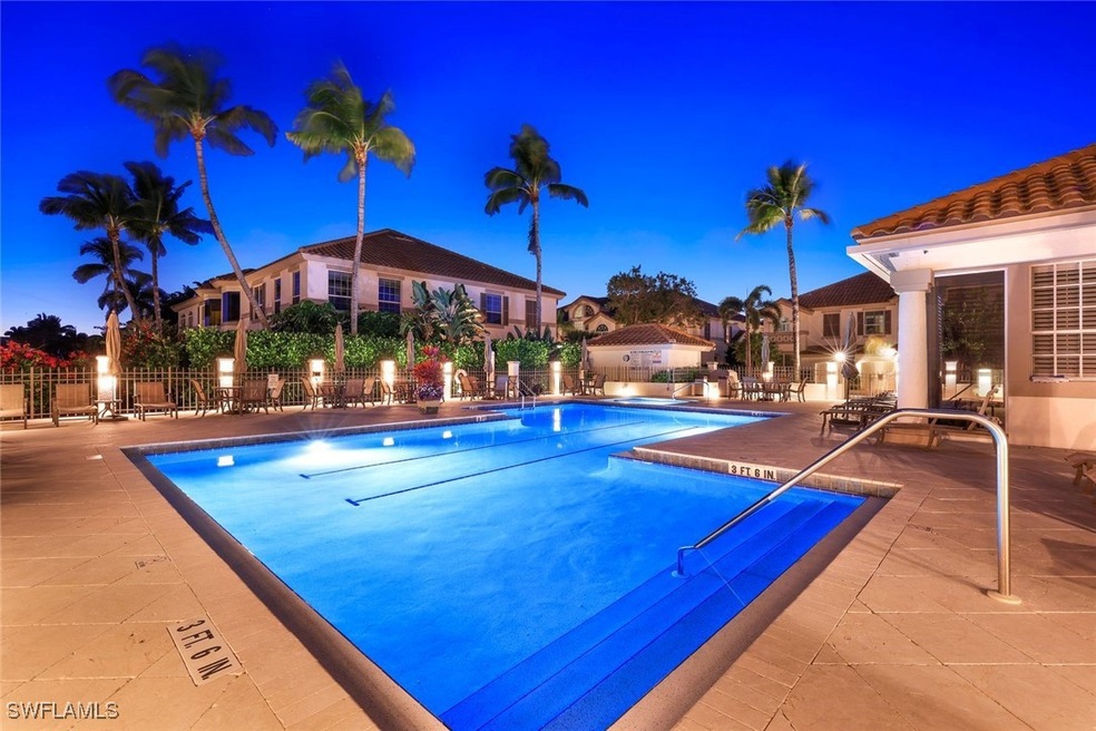 Community pool with a patio area
