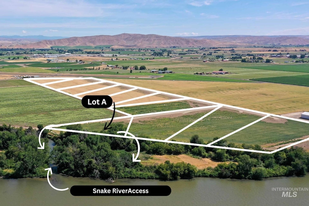 Overview of rural landscape featuring property boundaries highlighted and mountains