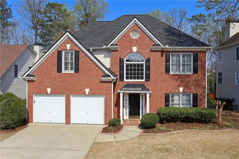 View of front property with a garage
