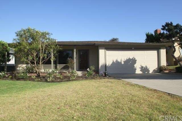 This fine home on a large lot is just a short walk