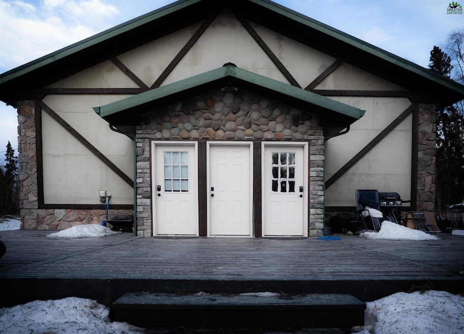 Door to the left is the upstairs unit.  Right is d