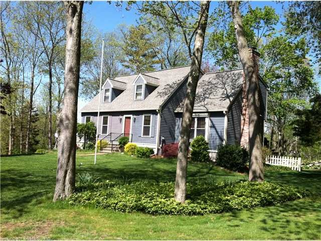 Exterior Front. Dormered Cape on lovely landscaped