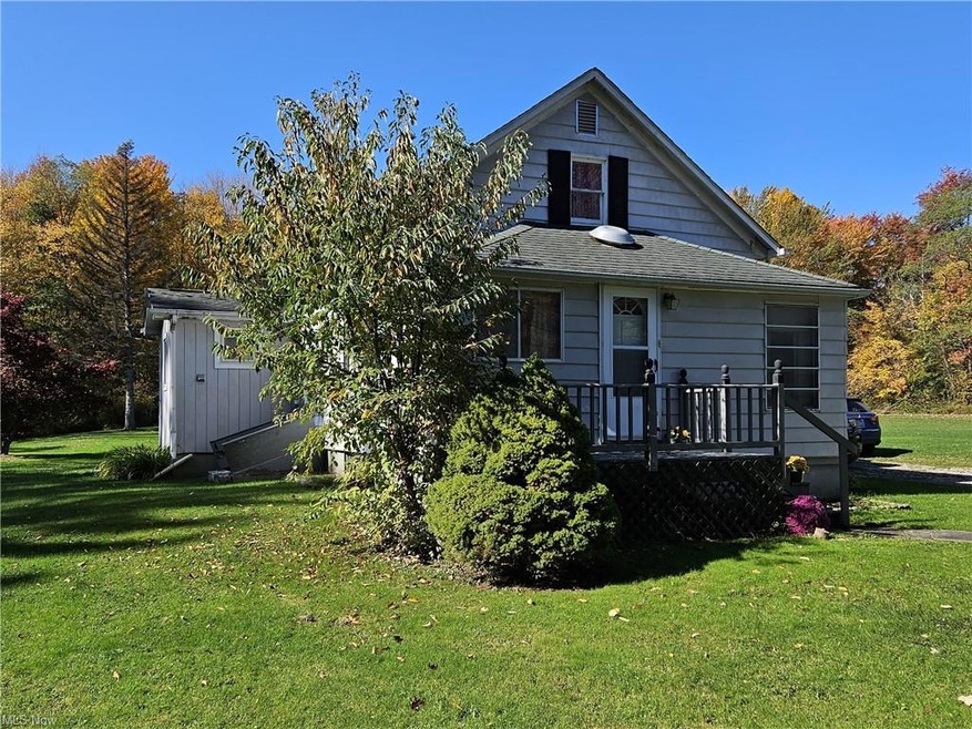View of front of property with a front yard