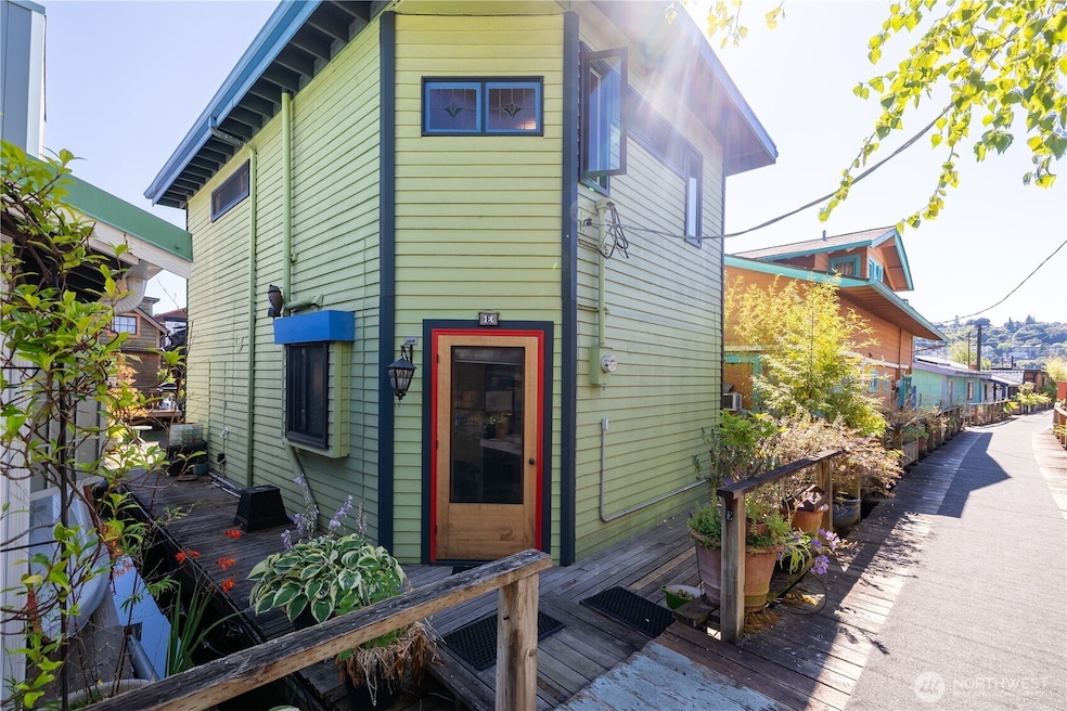 Long considered to be one of the most coveted homes on this dock, it has decks on three levels, views all around, and a show stopping kitchen.